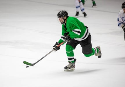  A hockey player on an ice rink